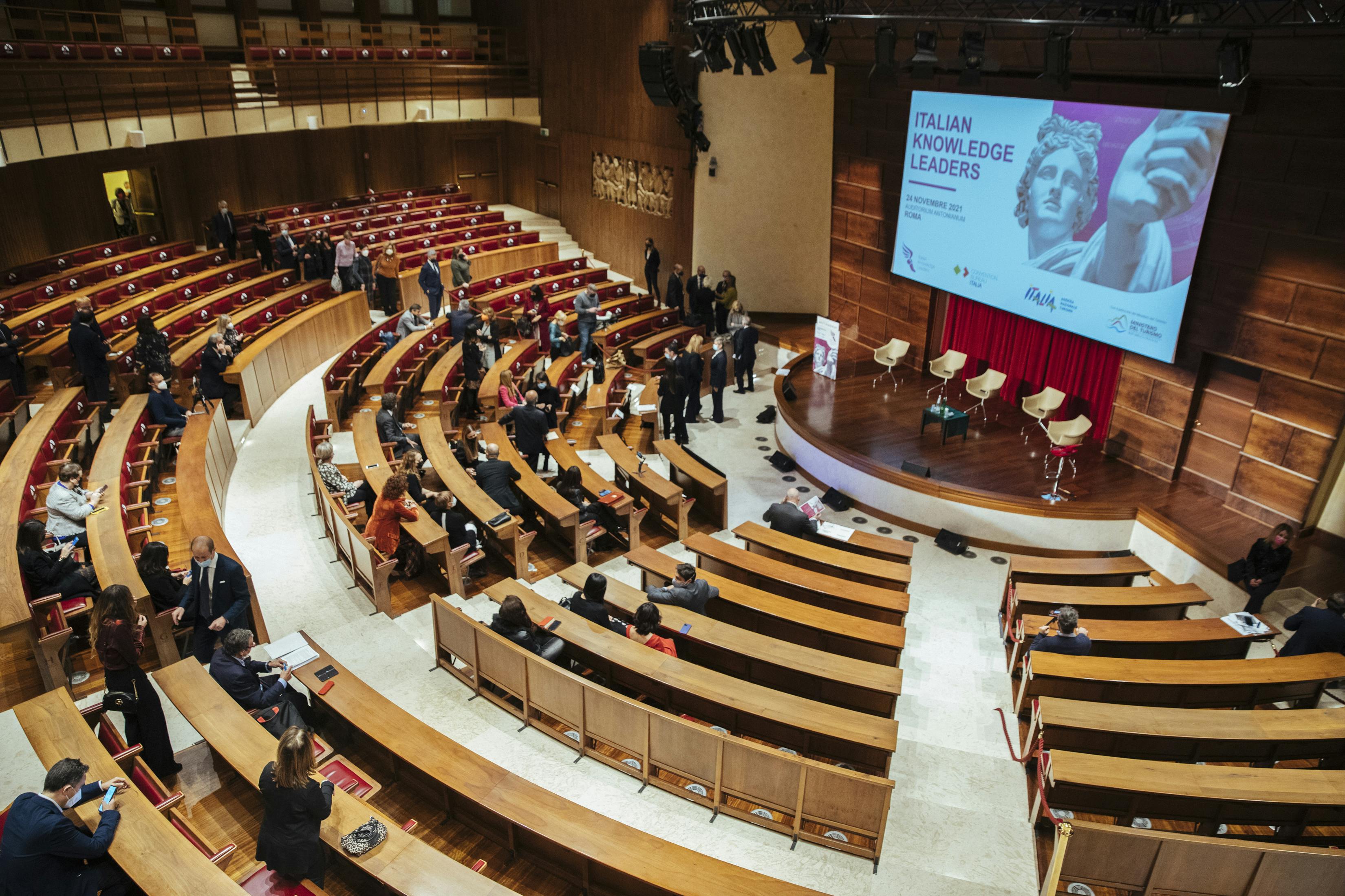 crowd waiting for italian knowledge leaders event at auditorium antonianum in rome italy