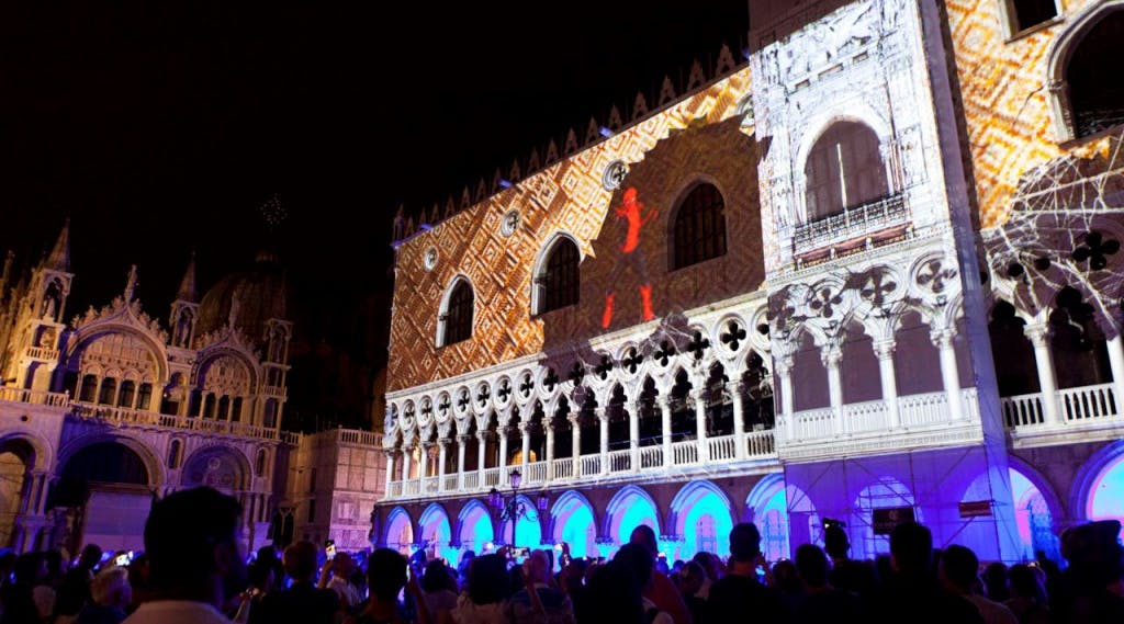 Piazza San Marco in Venice with many people during a screening
