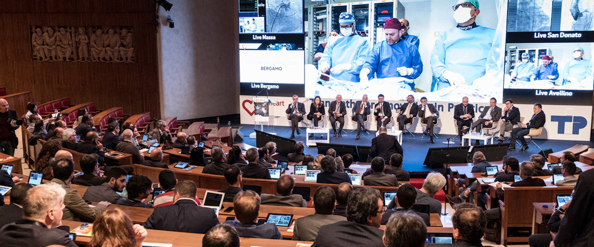 OIC header meeting di medicina con tante persone