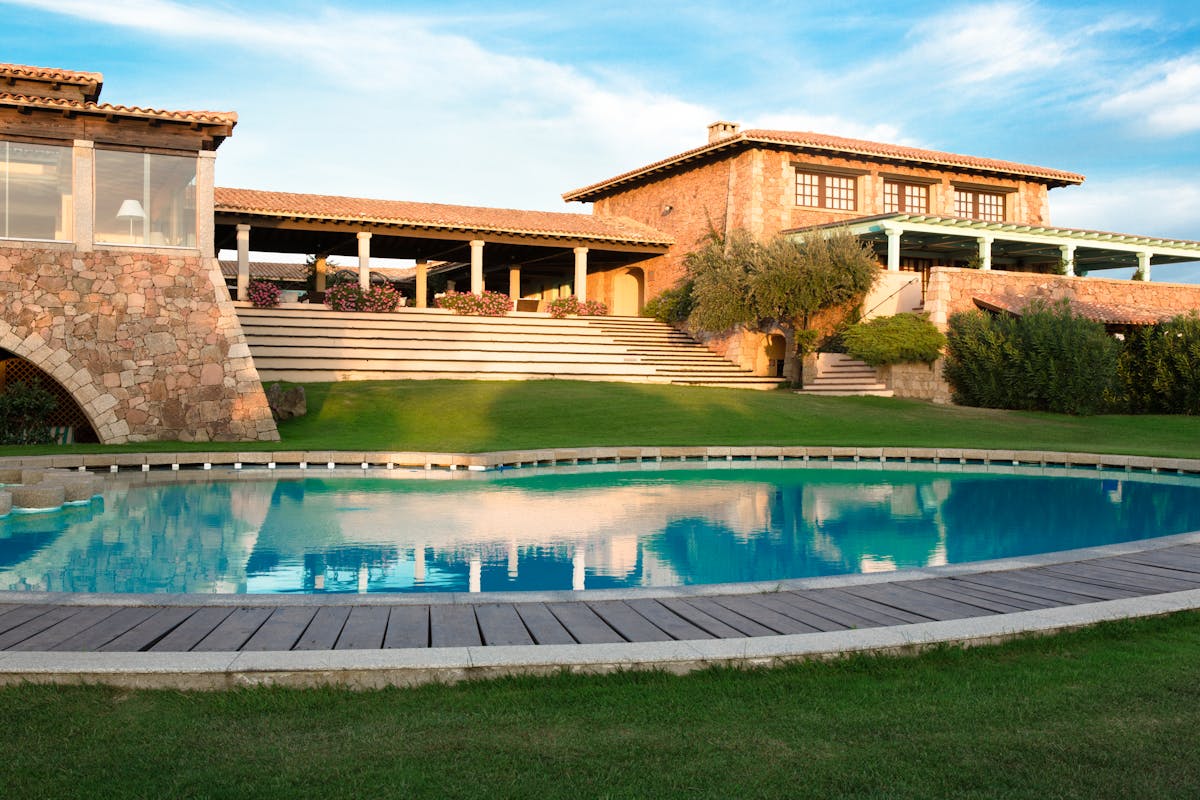 Hotel garden with outdoor swimming pool