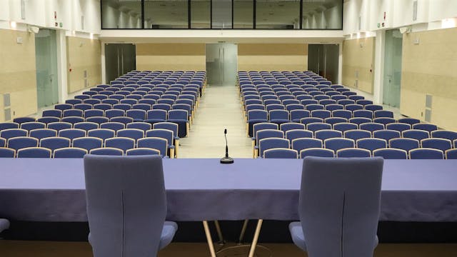 Meeting room with blue table and chairs