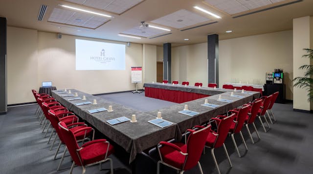 Meeting room-red chairs-gray table-hotel