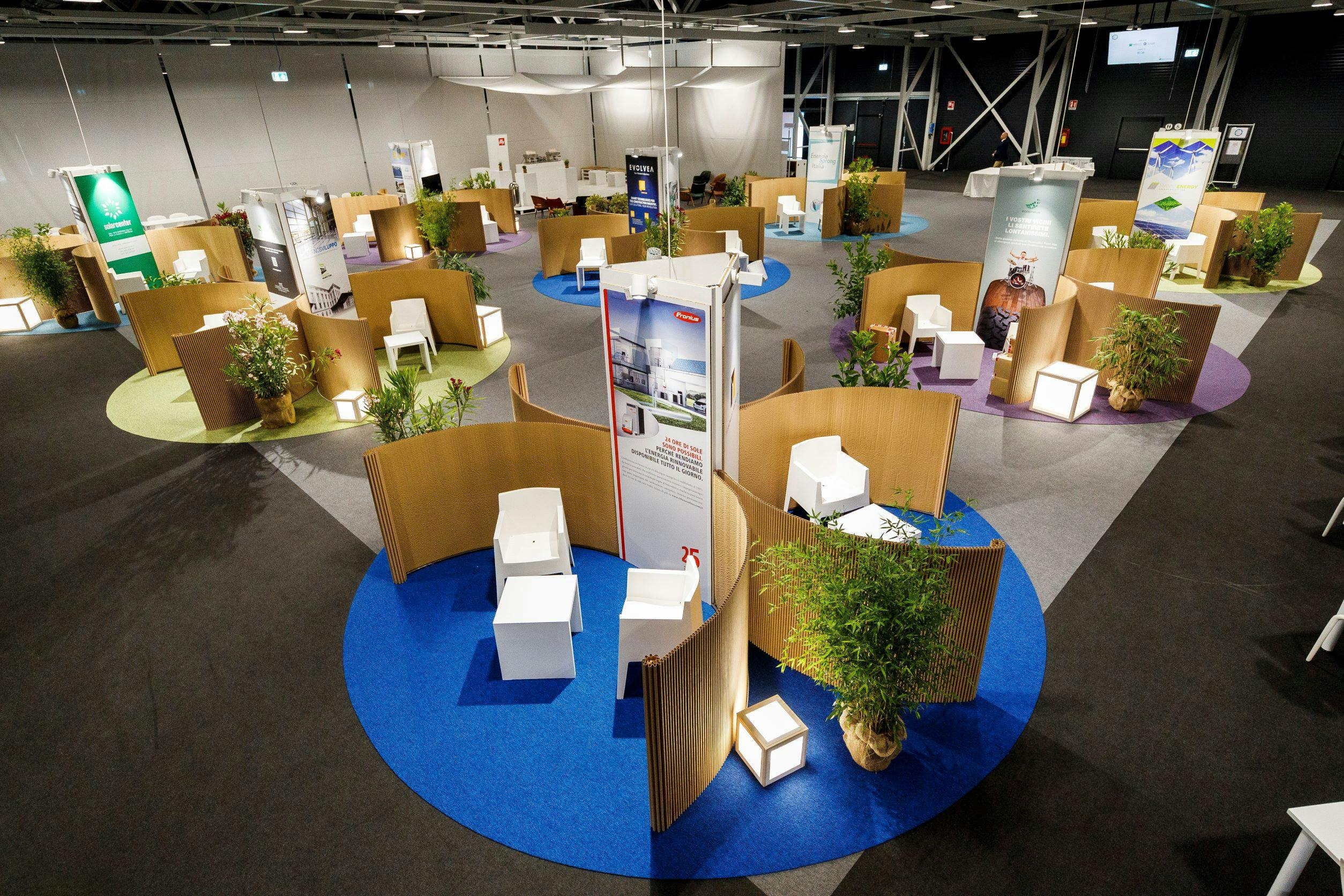 Exhibition hall with plants and stands