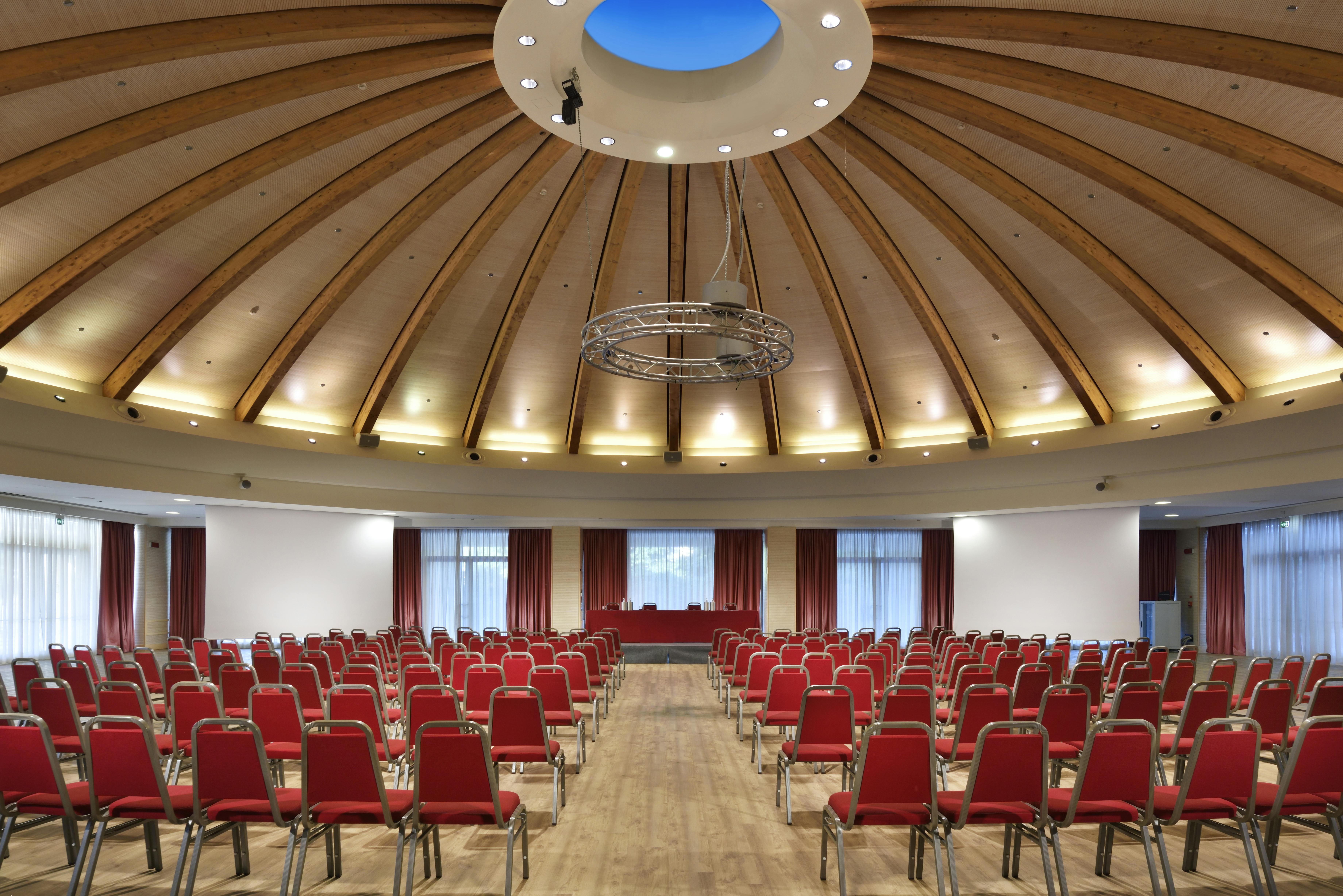 Meeting room with red chairs