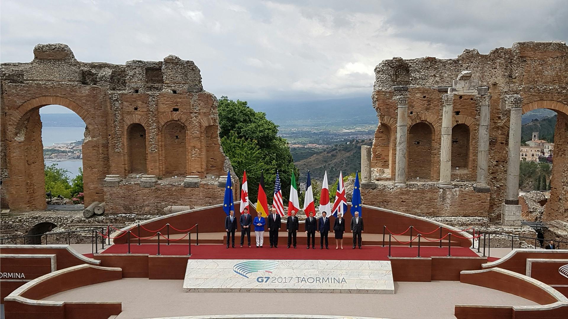 Meeting with ruins in the background