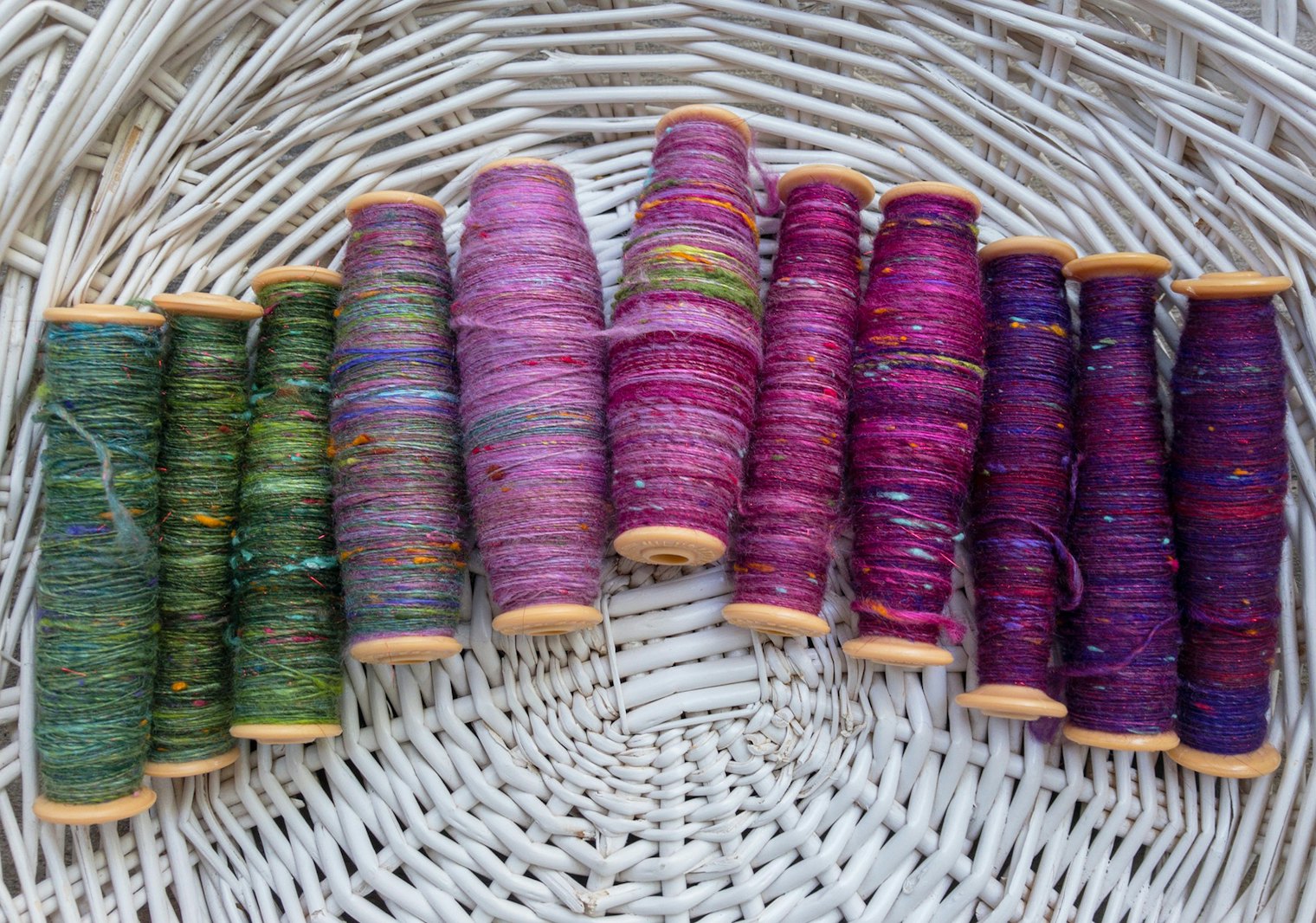 singles wound on weaving bobbins