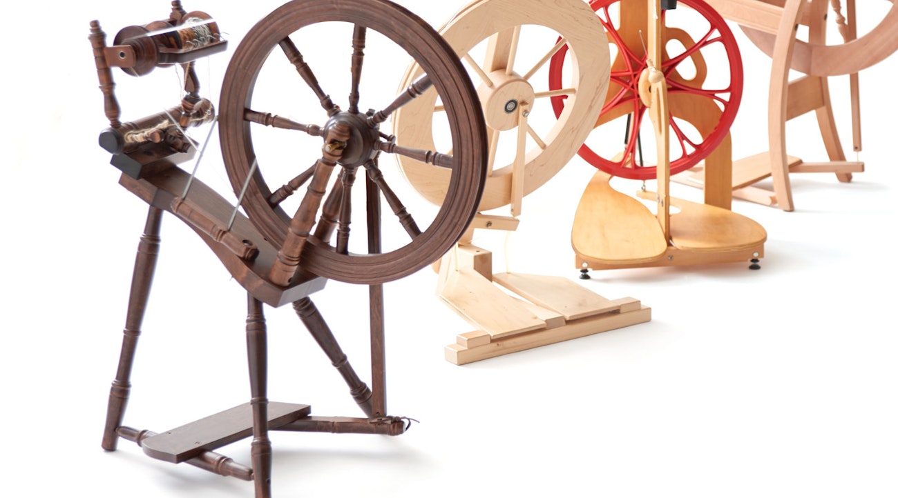 Spinning wheel treadles