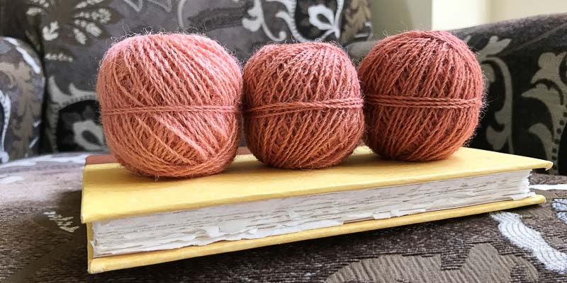 Handspun fingering-weight Llanwenog 2-ply. Madder dyed (cool method) from left: one day, two days, four days. Photos by Kate Larson