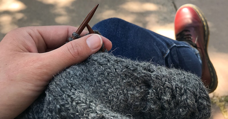 knitted swatch on someone's lap