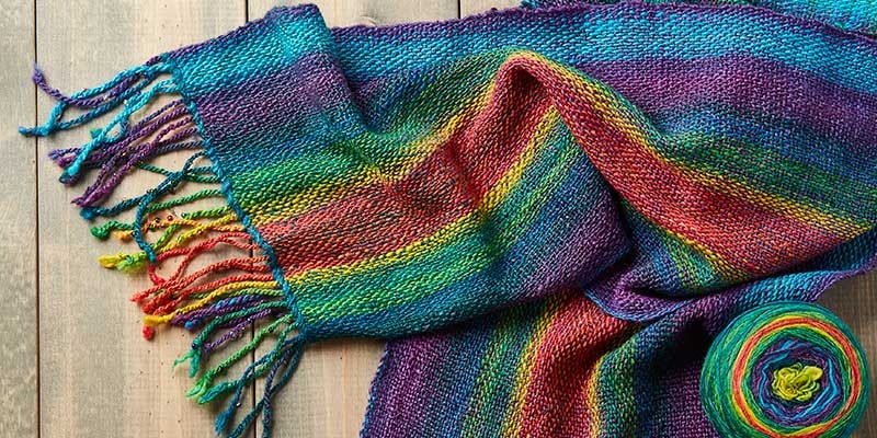 The Kissing Singles Scarf is named for its gentle method of beating the weft.