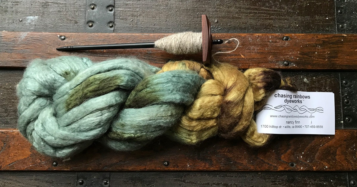 A drop spindle makes it easy to spin on the go. (Spindlewood spindle and Merino/silk by Chasing Rainbows shown.) Photo by Kate Larson