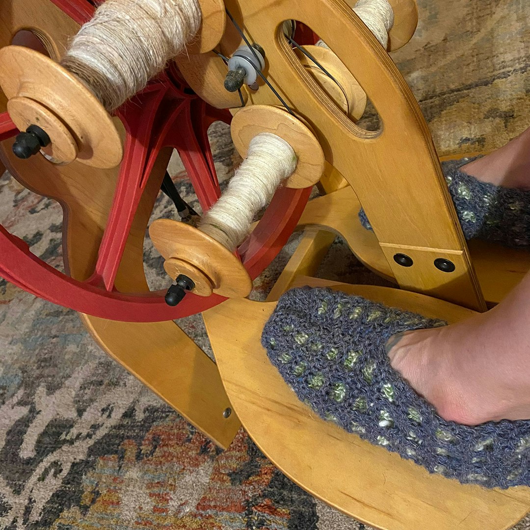 photo D- At the wheel with slippers on