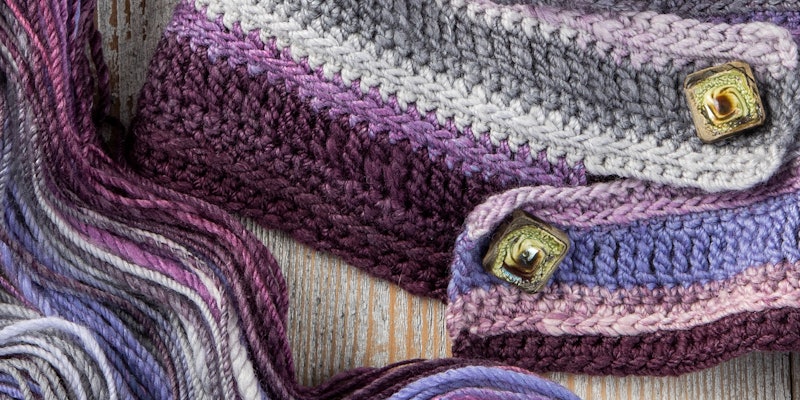 A purple and gray cowl with interlocking tabs