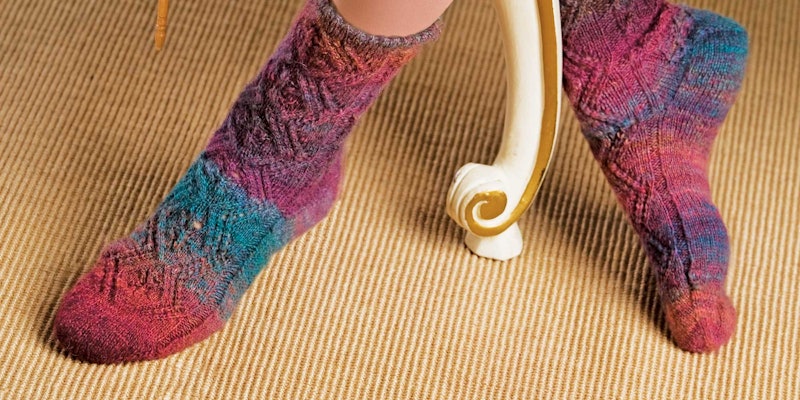 Not long after Kristi Schueler bought her first wheel, she was experimenting with Kool-aid dyeing for socks. Photos by Joe Coca unless otherwise noted