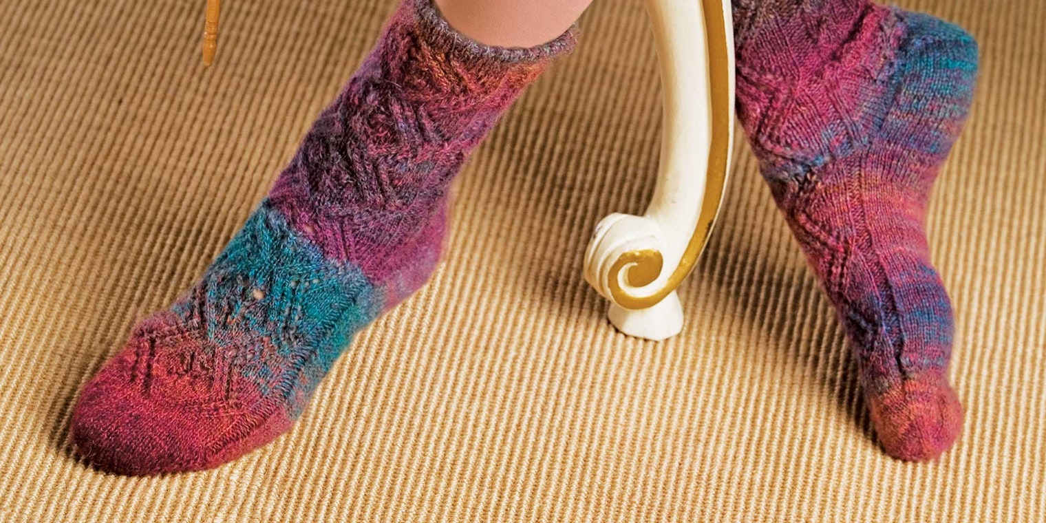 Not long after Kristi Schueler bought her first wheel, she was experimenting with Kool-aid dyeing for socks. Photos by Joe Coca unless otherwise noted