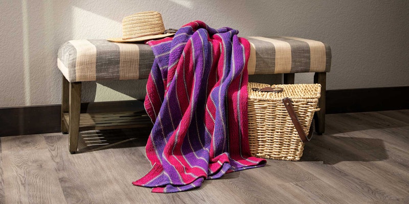 pink and purple woven blanket