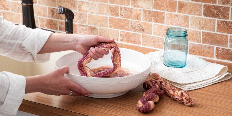 yarn in bowl of water