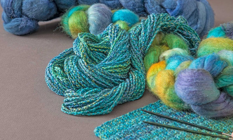 turquoise yarn and knitted swatch
