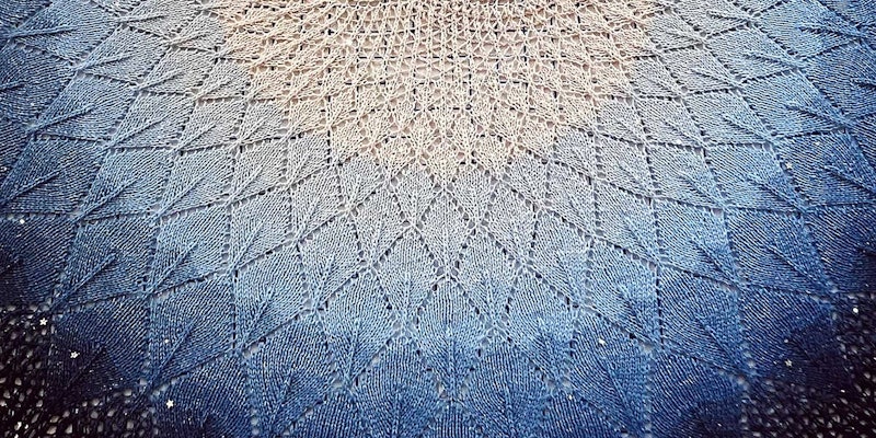 blue and white knitted shawl