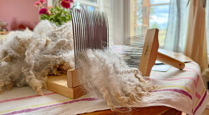 locks of wool with wool comb