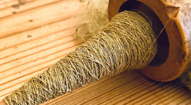 spool of spun nettle fiber