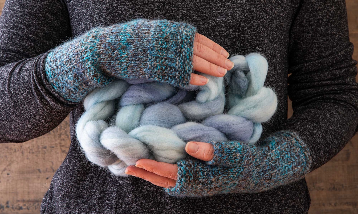 hands holding braided fiber