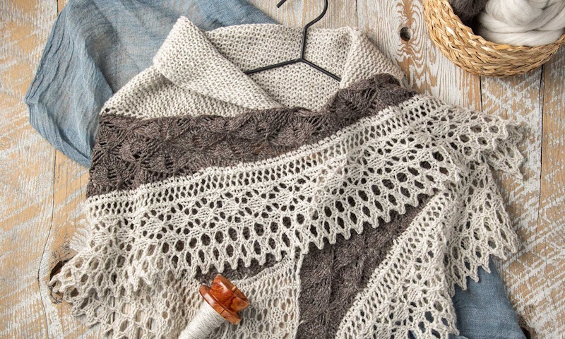 brown and off-white knitted shawl