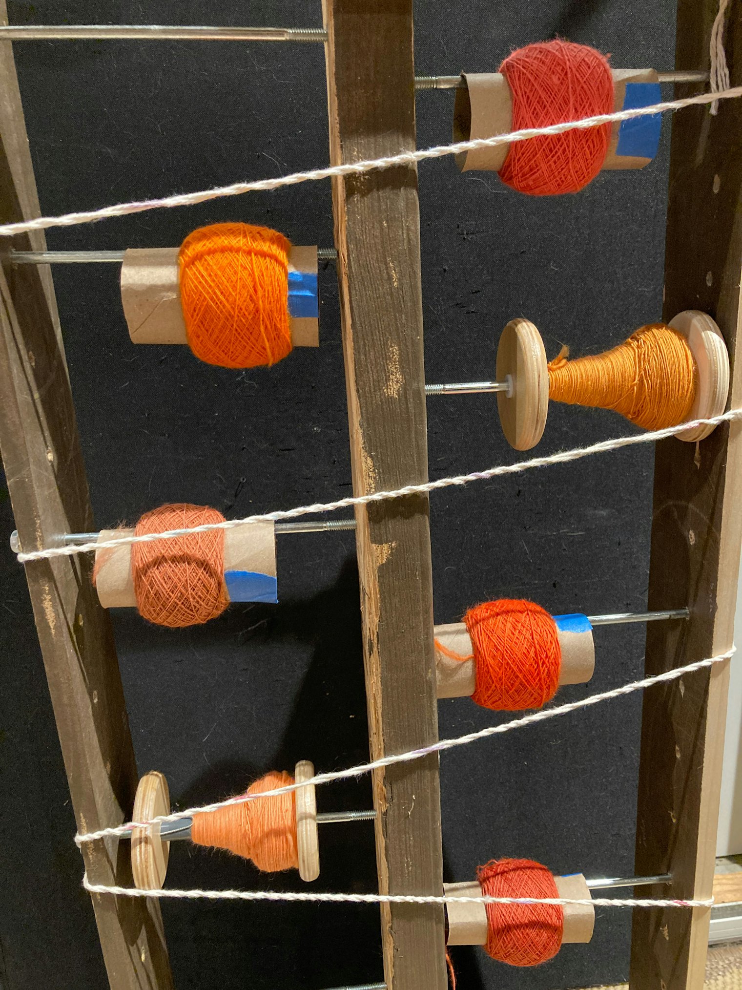 A look at Kat's lazy kate with 7 bobbins.