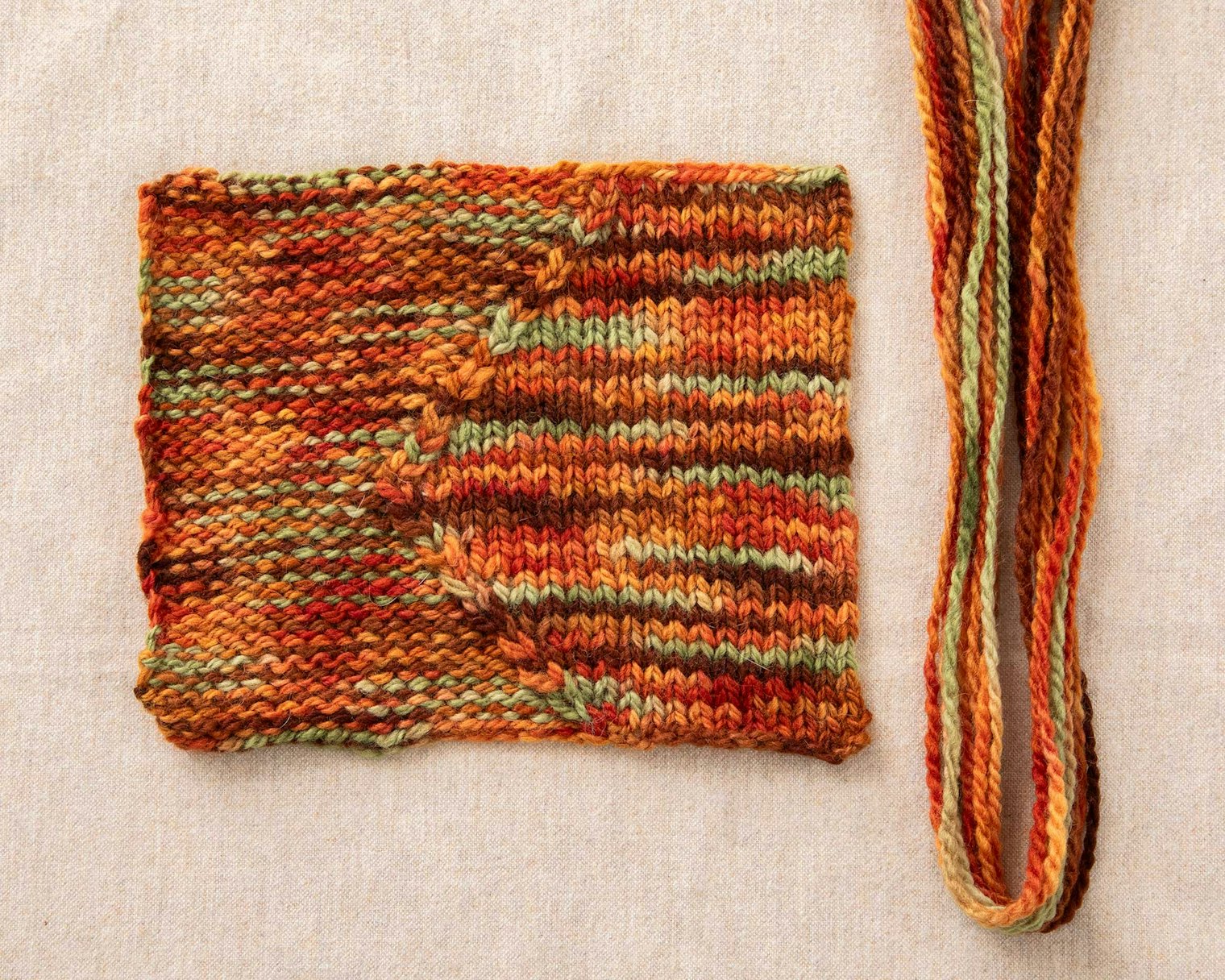 Swatch four was spun, then dyed, and shows the stitch pattern well.