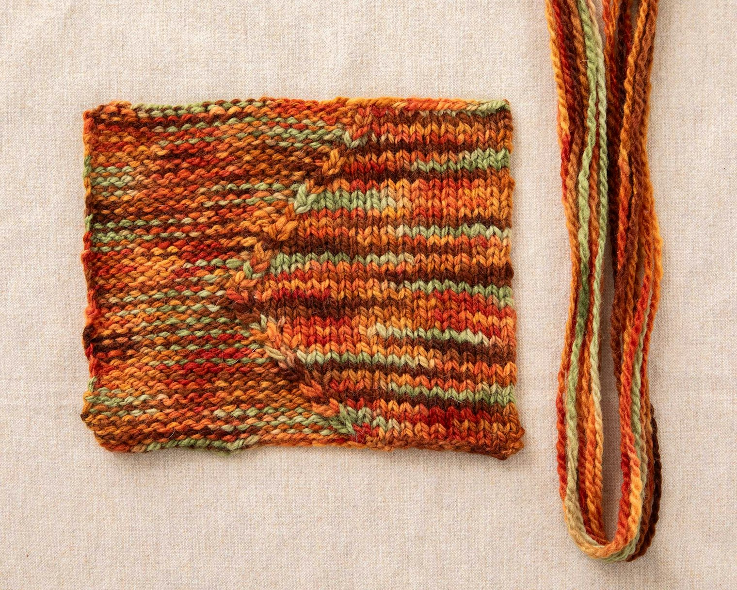 Swatch four was spun, then dyed, and shows the stitch pattern well.