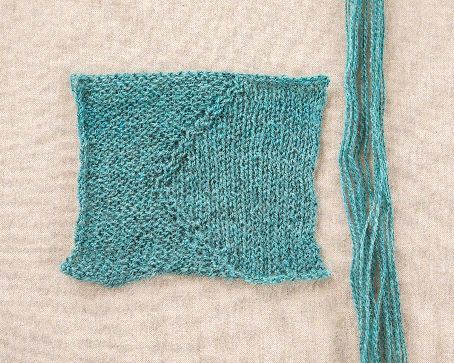 Swatch two shows a subtle play between the stockinette and reverse stockinette sections.