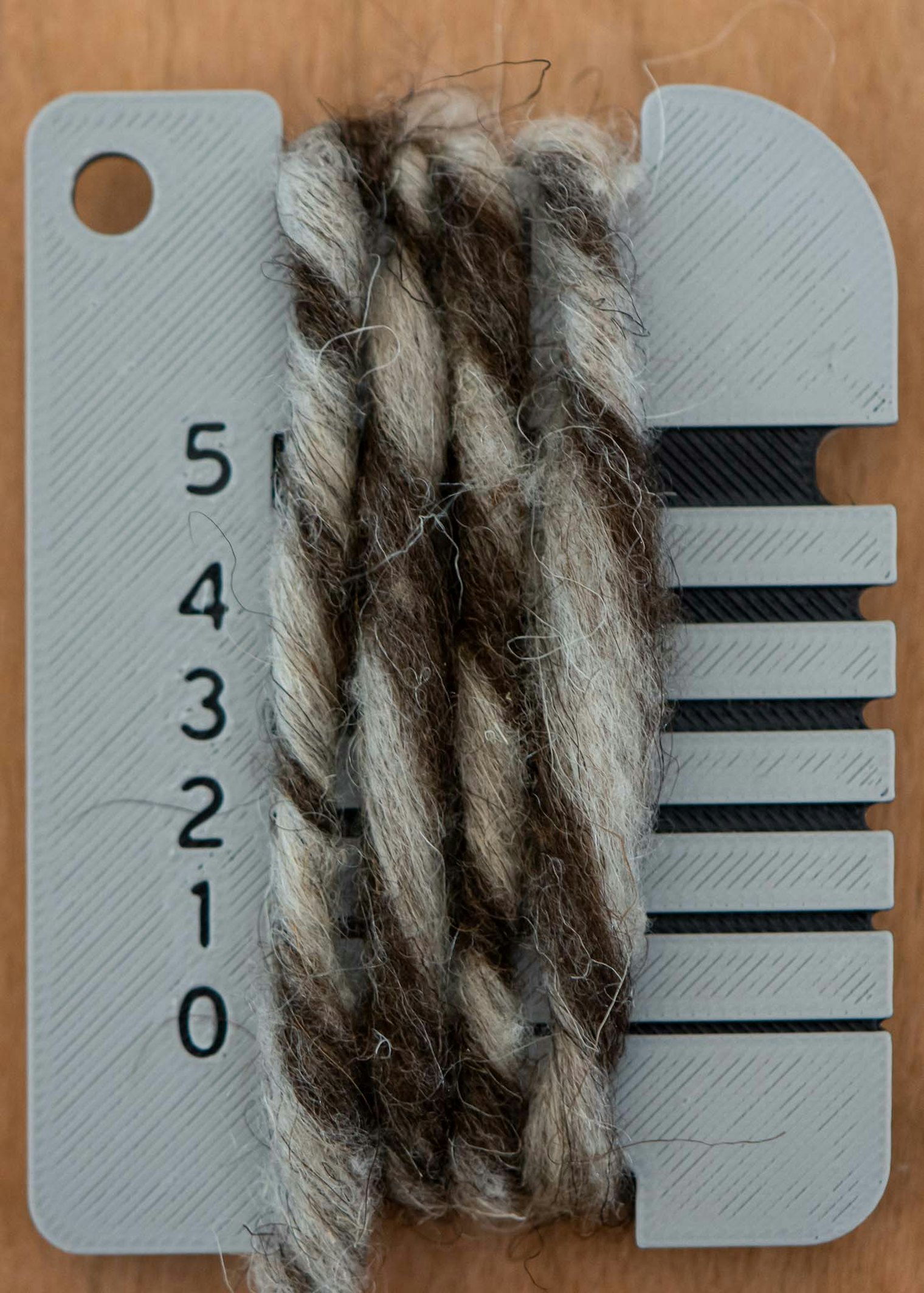 Some control cards also include a one-inch notch to let you take more precise wraps per inch measurements.