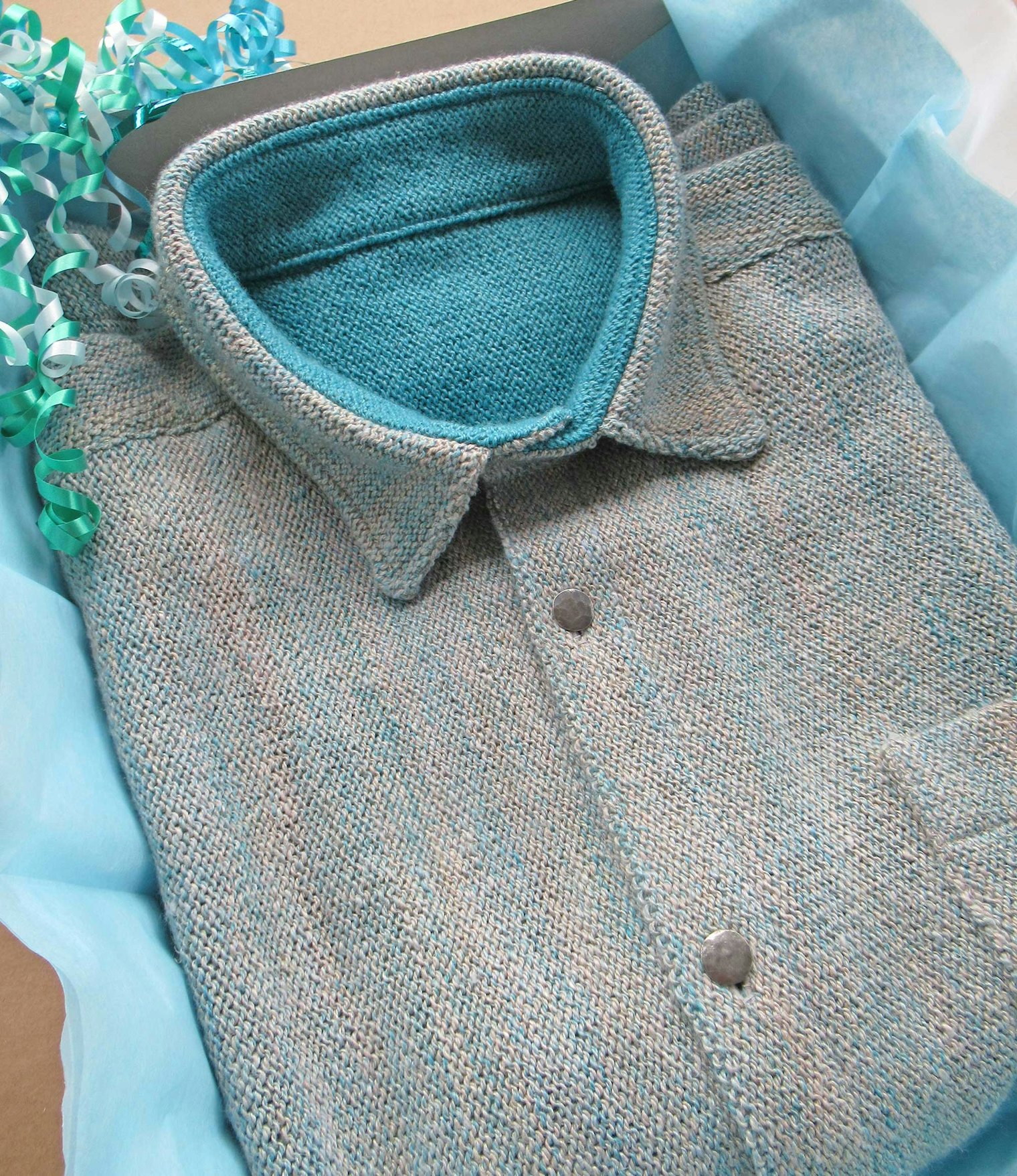 The shirt was finished off with hammered pewter buttons.