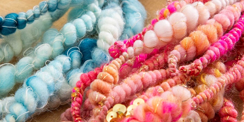 pink and blue yarns