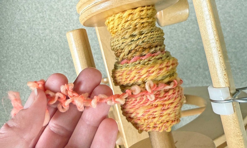 bobbin of twisted yarn