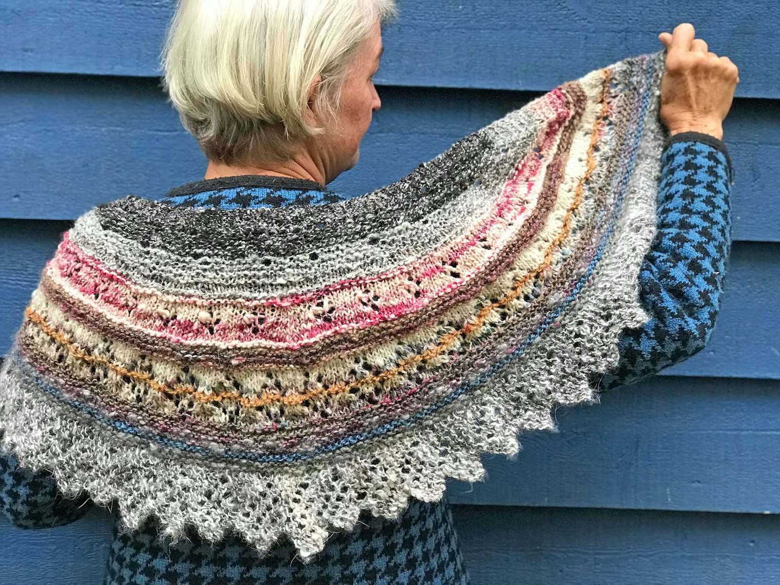 Martha models her knitted shawl, made from odds and ends of handspun. Photo by Martha Owen
