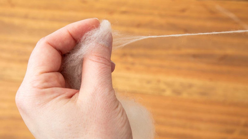 Hand drafting short-stapled fiber