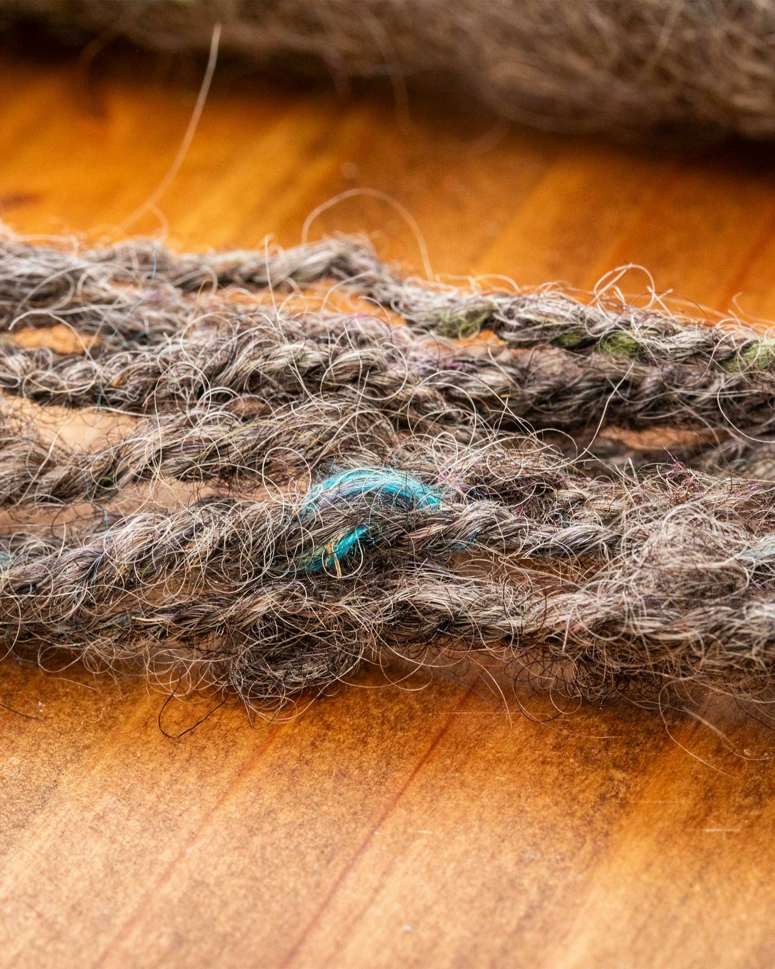 After the yarn is spun, the colors in the tweed add subtle visual interest.