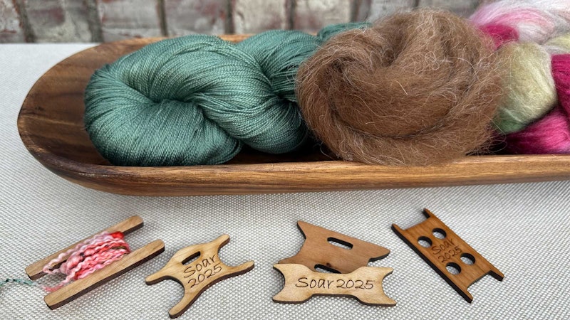 Clockwise, from top left: silk from Treenway Silks, fiber from Double K Diamond Llamas and Fiber, a braid from Greenwood Fiberworks, and special SOAR 2025 thread winders from The Dancing Goats