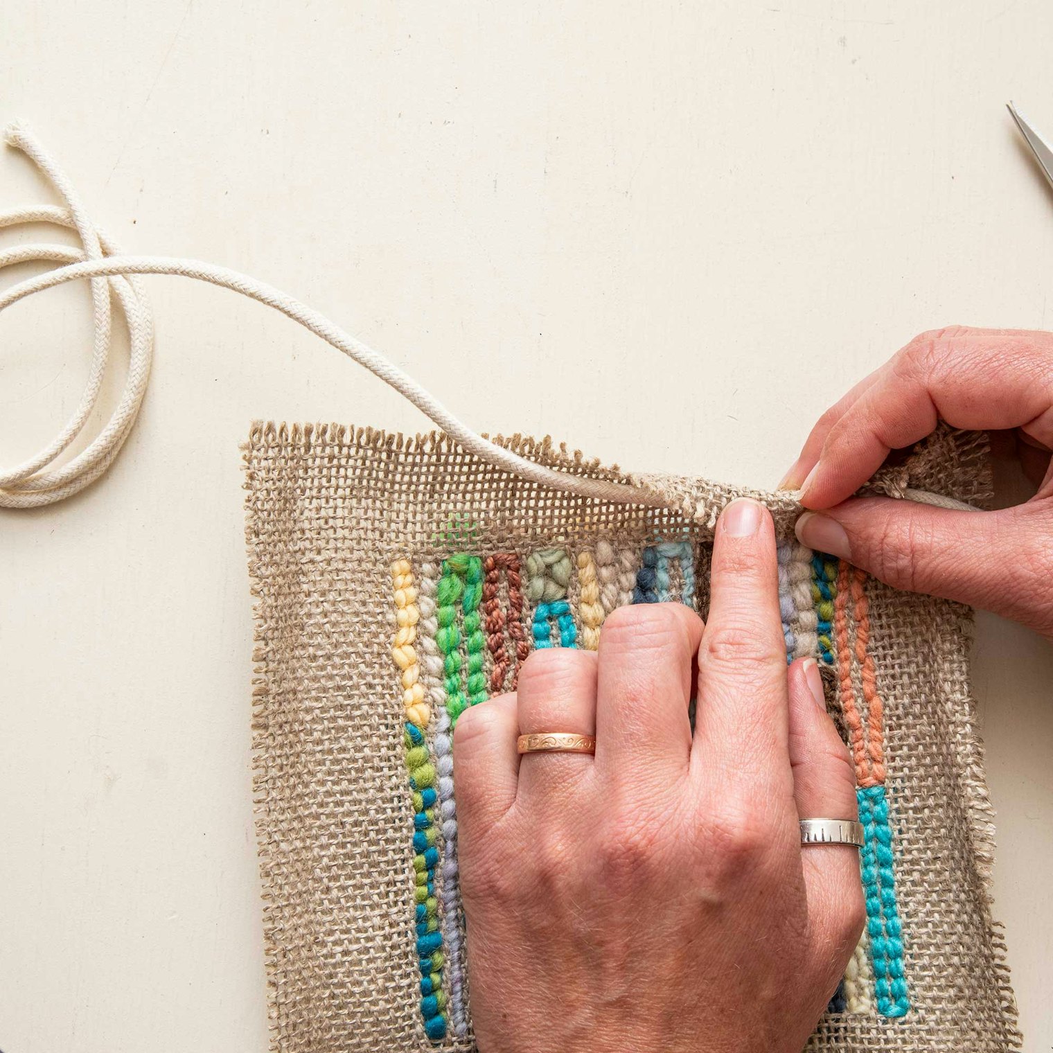 Wrap the trimmed backing cloth around a cord.