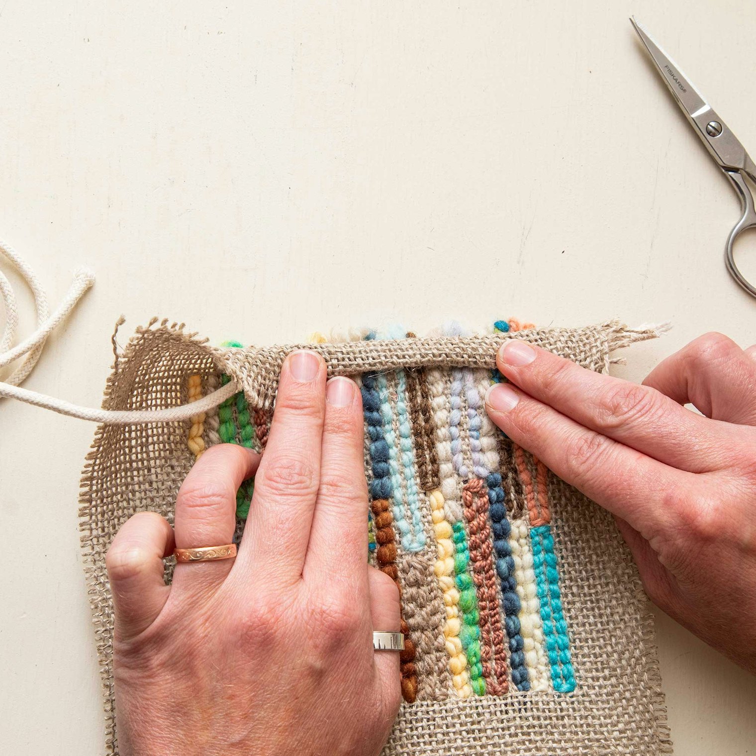 Wrap the trimmed backing cloth around a cord.