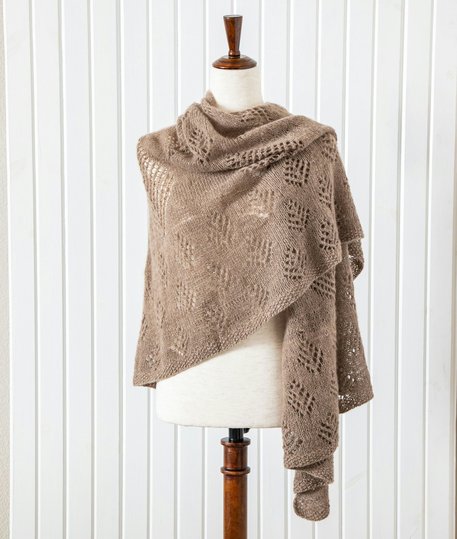 "My favorite shawl shape is that of the traditional shawls knit for many years in the Faroe Islands. Traditional Faroese shawls have shaping in the shoulders and in the back, making the shawls fit wonderfully without the use of a shawl pin. They may be worn with the ends free or wrapped around and tied in the back, leaving hands free to do whatever is needed."