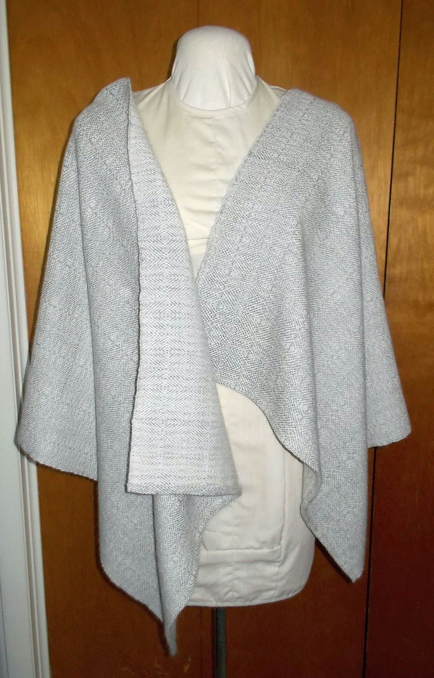 Cashmere and Silk Shawl. Photo and submission from Teresa A. Knutson. "I originally had the white 95 percent cashmere and 5 percent mink yarn and wanted to make a handwoven shawl."