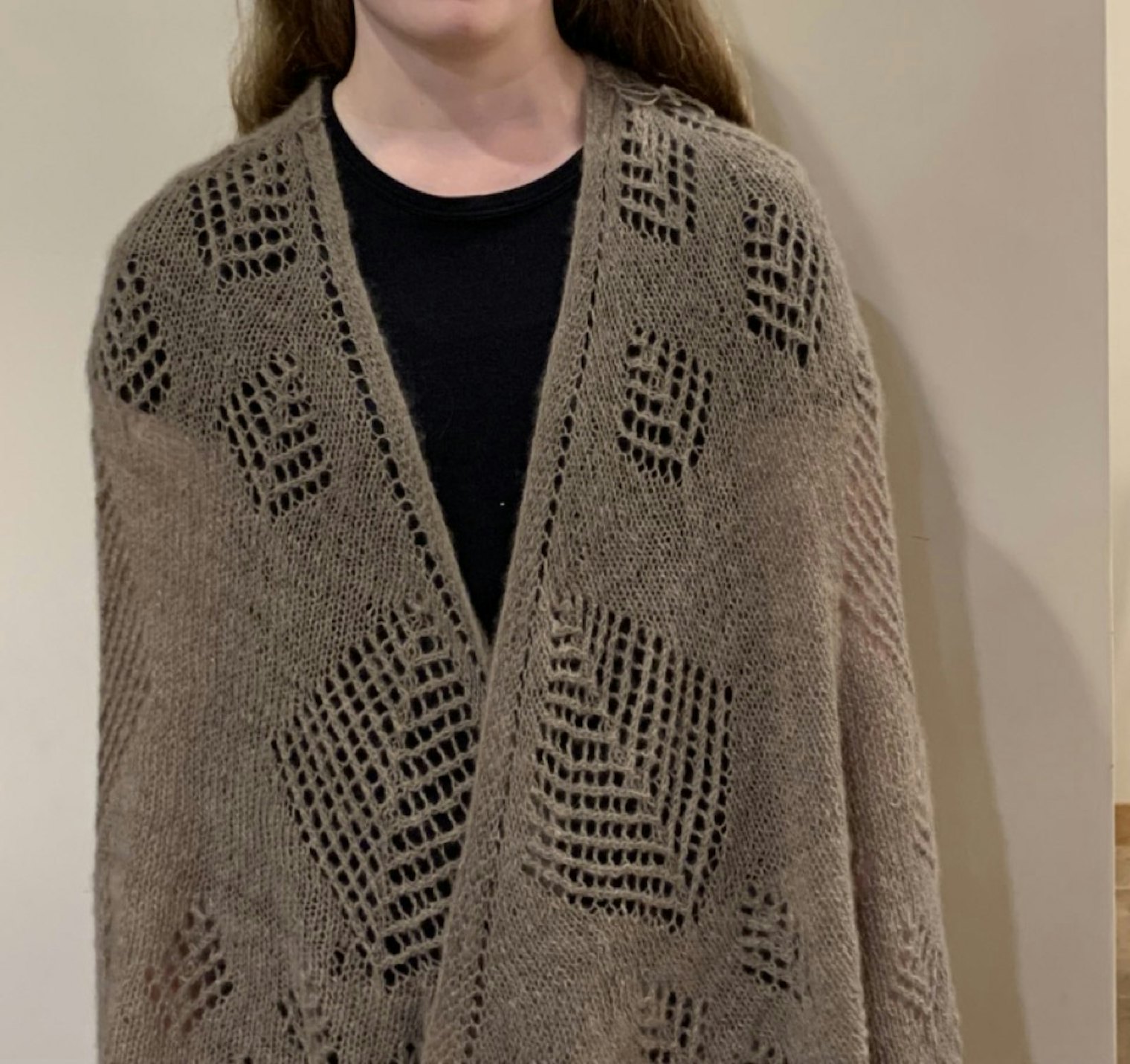 Tree of Life Faroese-Shaped Shawl. Photo and submission from Myrna Anne Itzen Stahman. "The Shetland Tree of Life motif, which can be knit in many various sizes, represents the need for preserving the glaciers to save the environment."