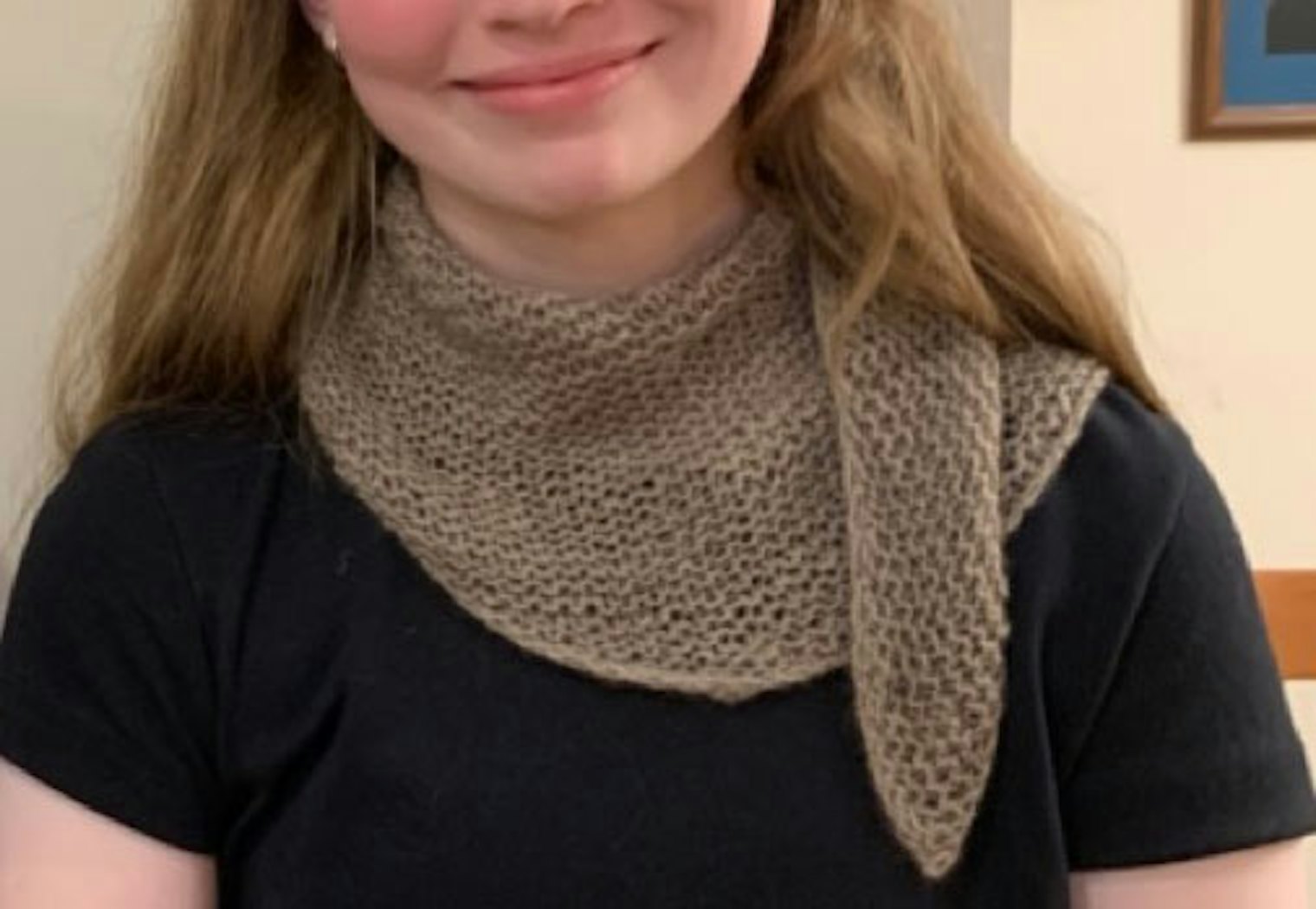 Crescent Scarf 1 - All Garter Stitch. Photo and submission from Myrna Anne Itzen Stahman. "This is one pattern I really enjoy knitting with wonderful yarn and giving as gifts."