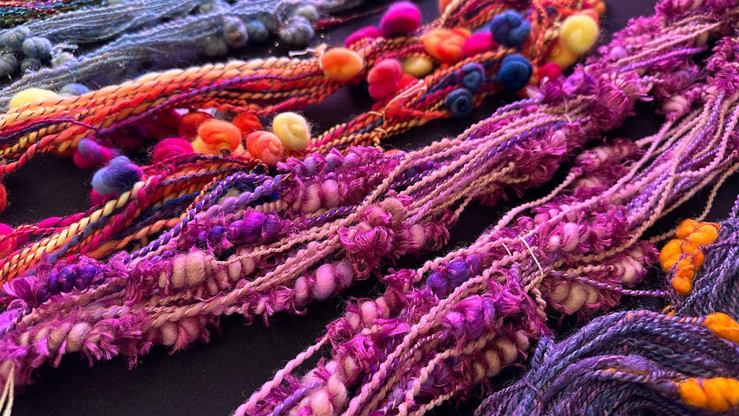 Hot pink and purple textured art yarn