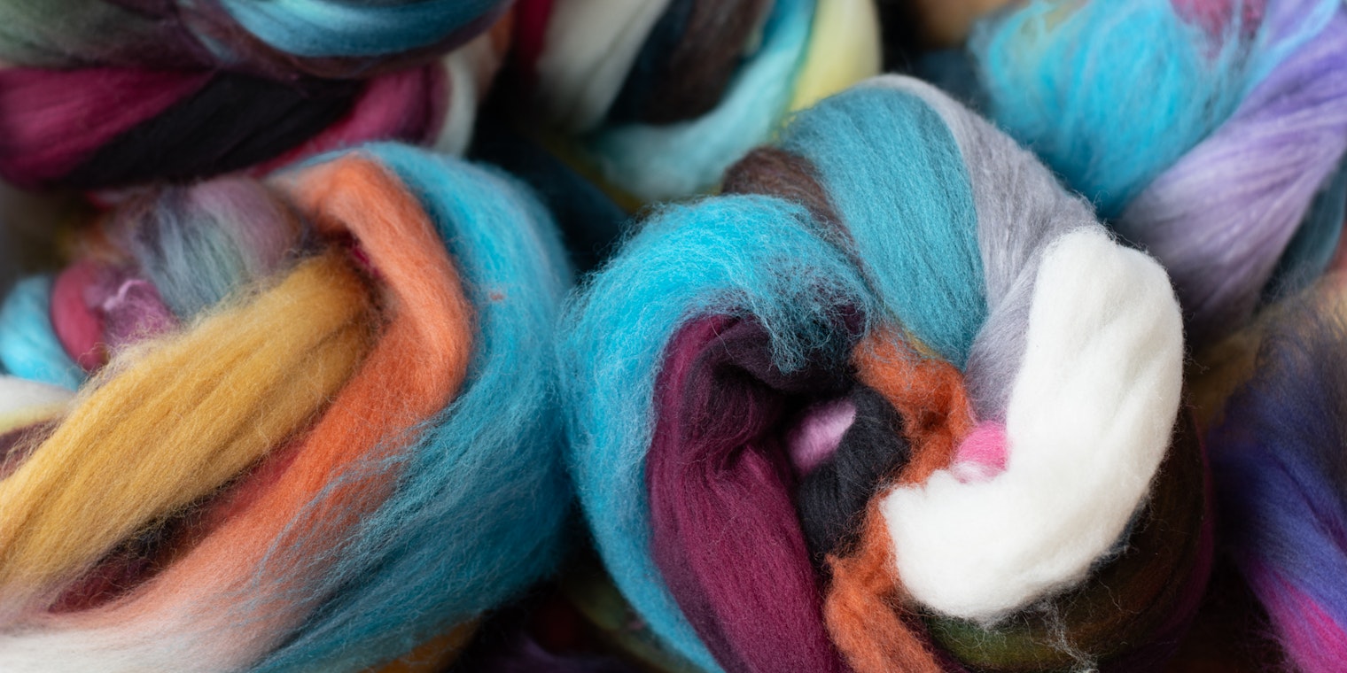 Bundles of multicolored fiber.