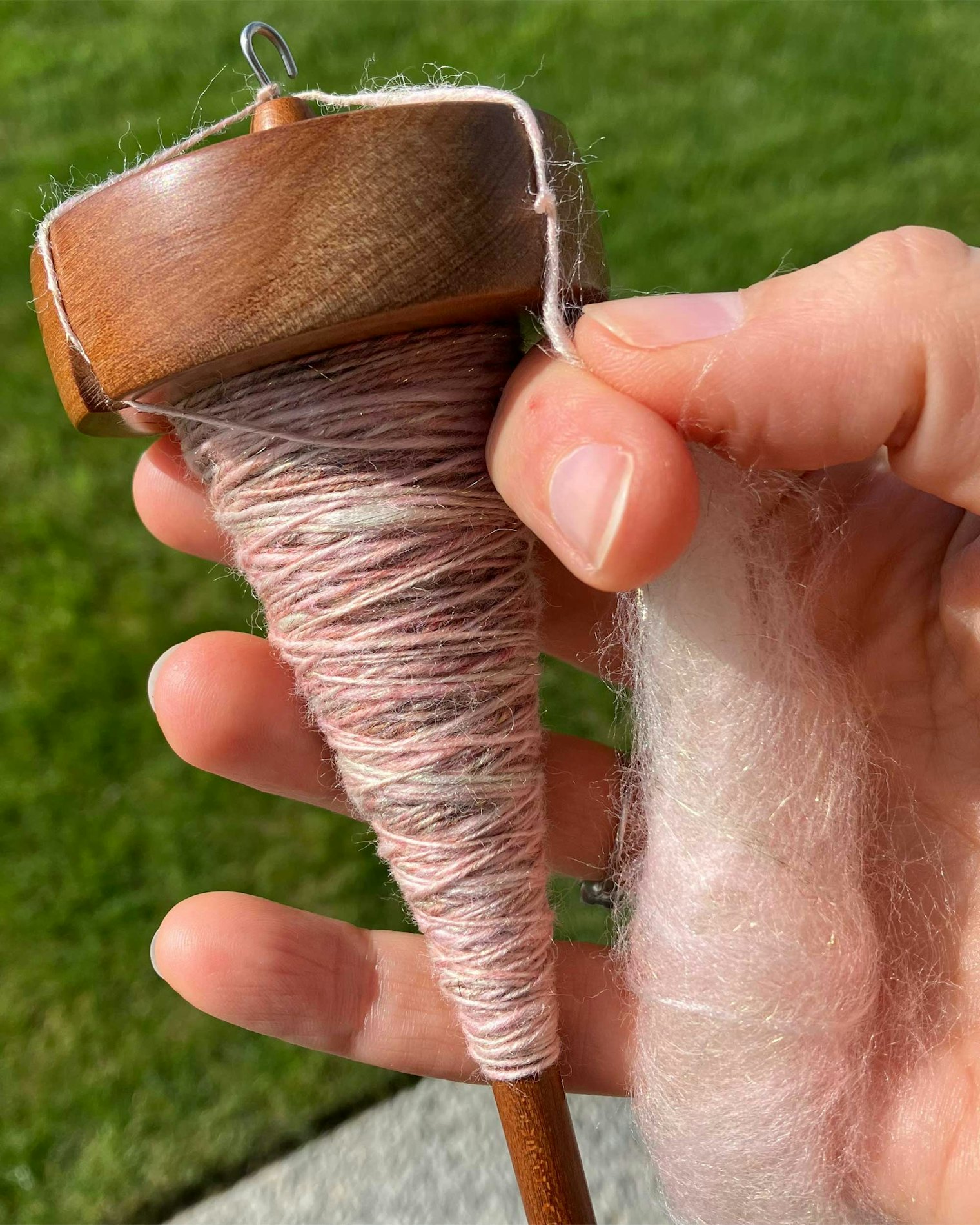 Starting to spin the Pink Petals colorway.