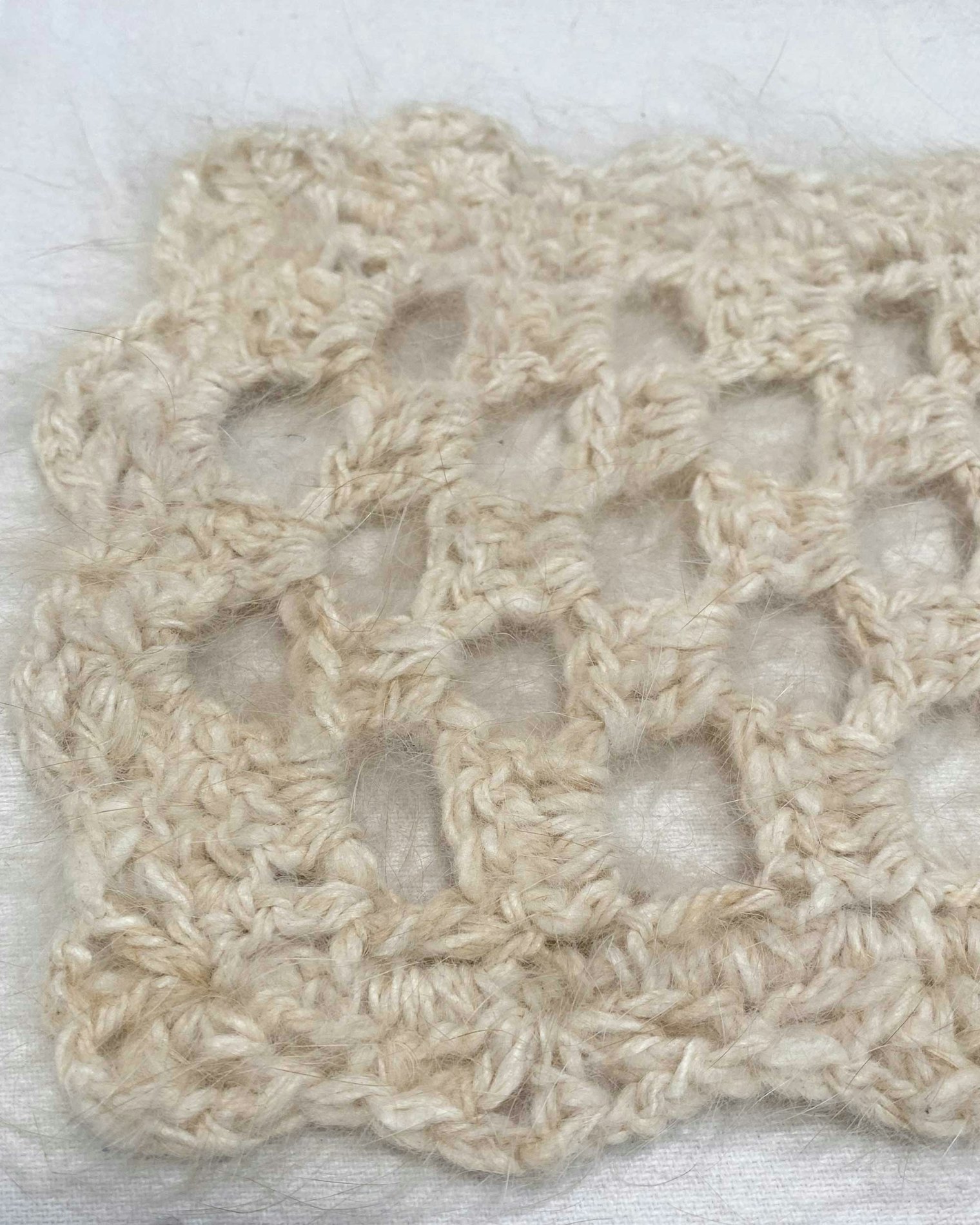 Notice how much halo there is in this pure angora crocheted sample.