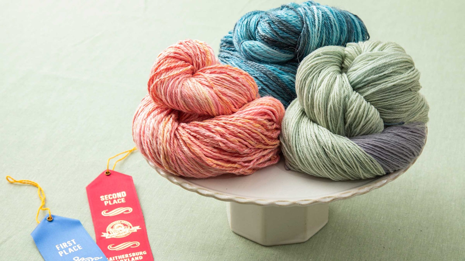 colorful yarns on a cake platter